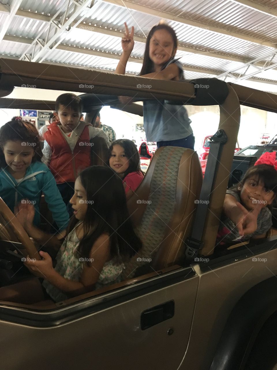 Kids having fun on jeep