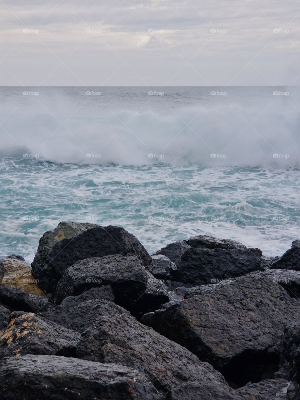 Waves crashing on the rocks