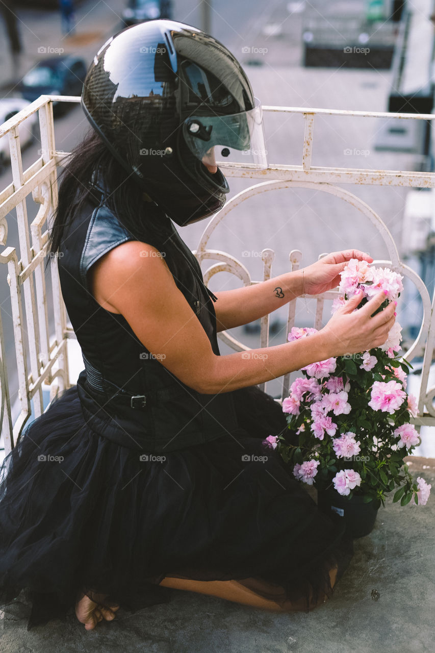 Living on harmony. Cute girl and flowers 