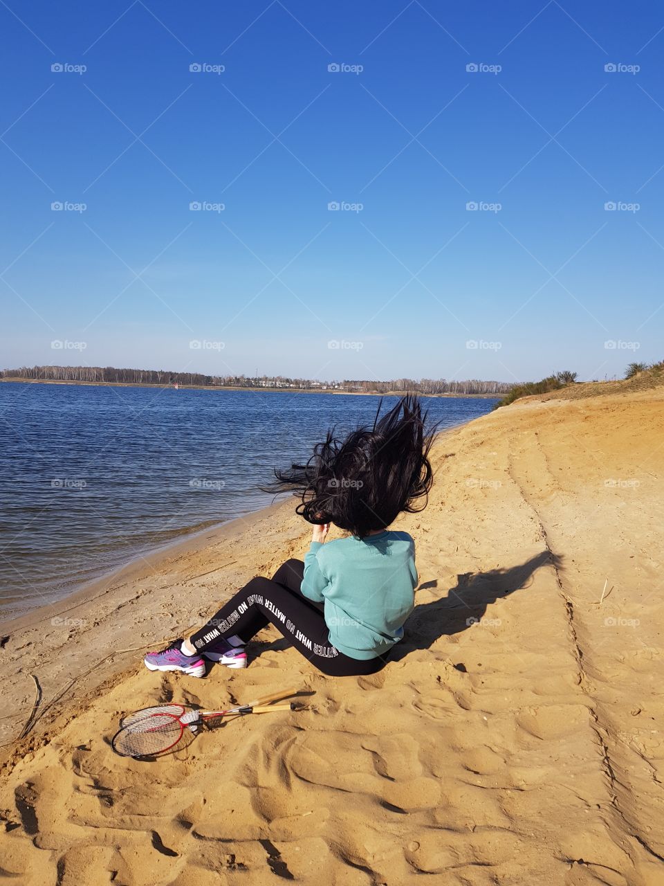 girl with black hair on the shore 2