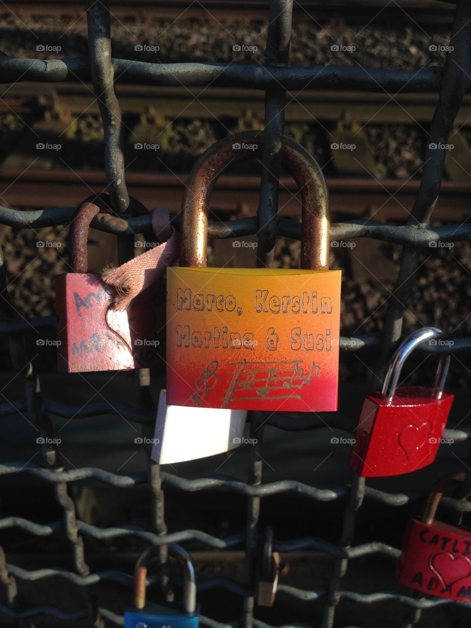 Love Locked. Lovers padlock locked to a fence