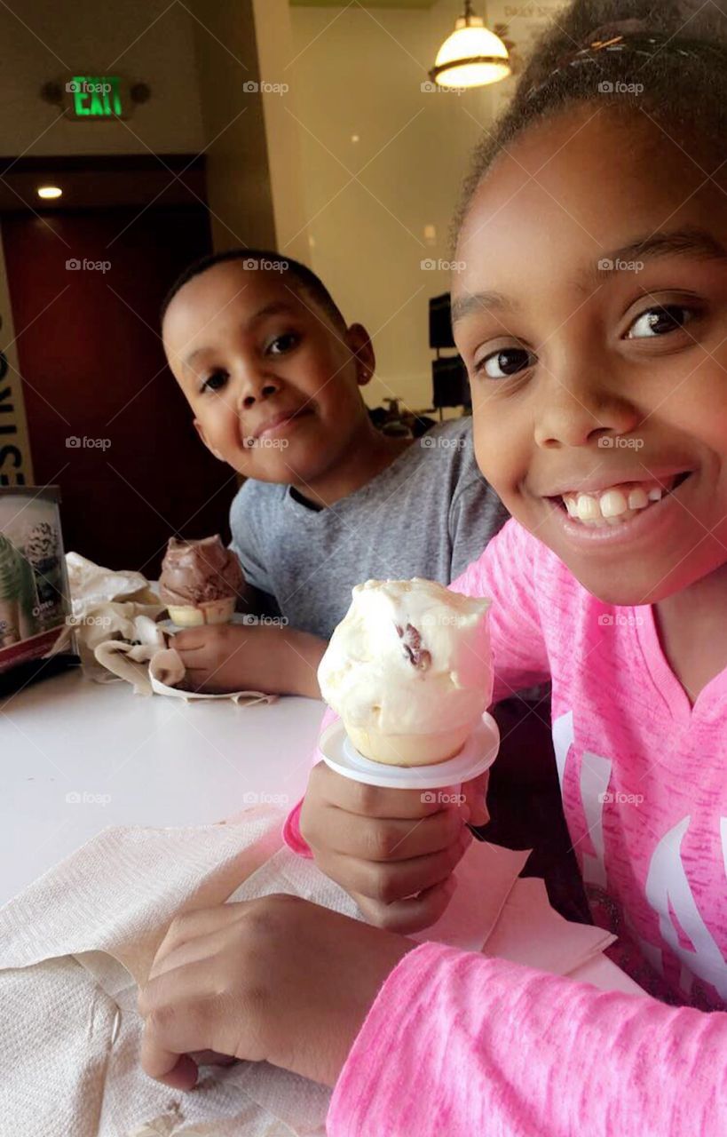 Cute kids eating ice cream happy