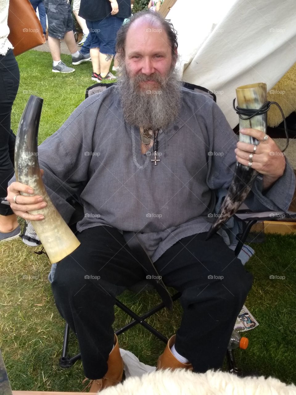 viking in garb with drinkingnhorns