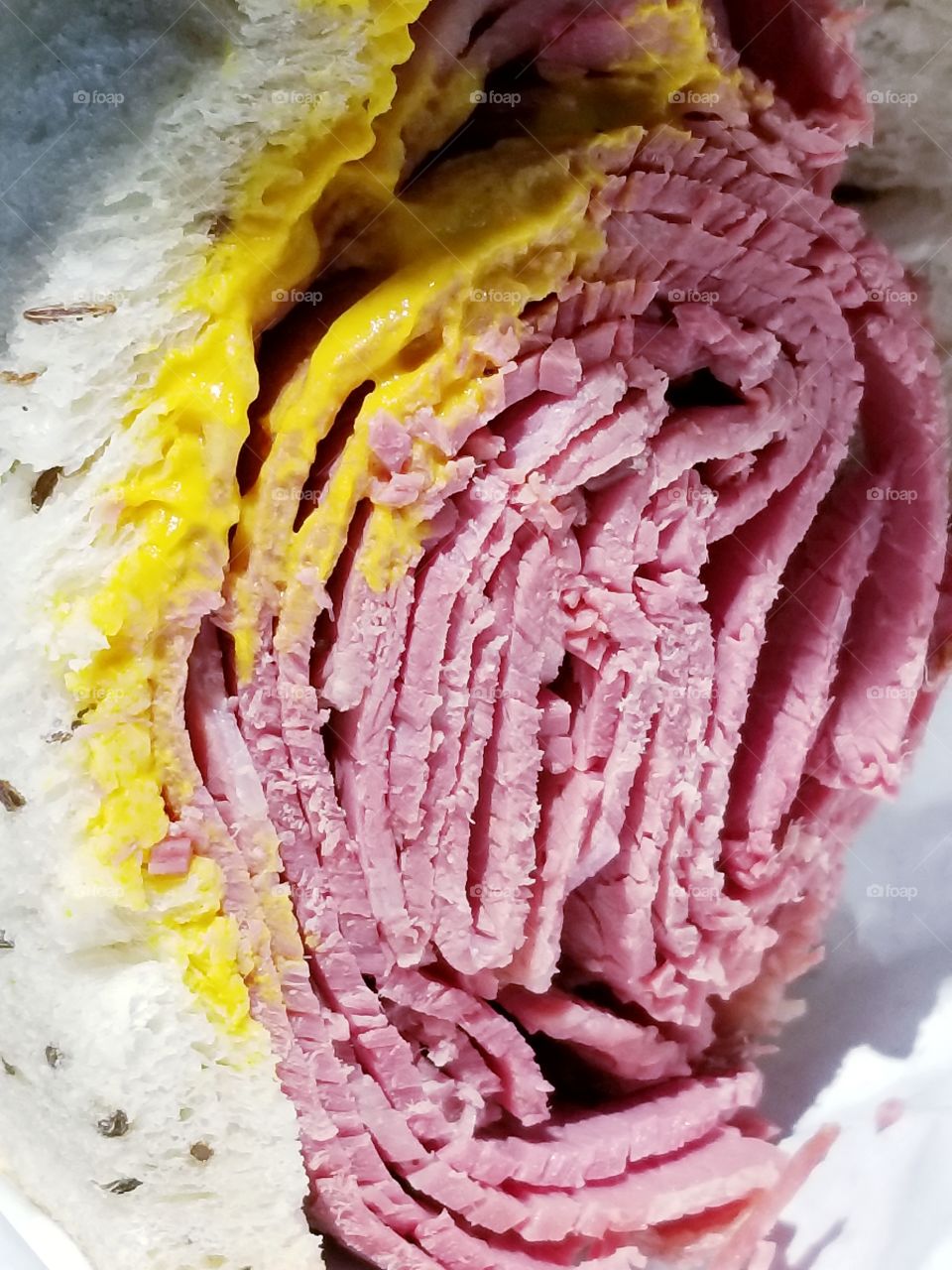 Extra lean corned beef on rye with yellow mustard at Pomperdale's Deli in Fort Lauderdale Florida - delicious!