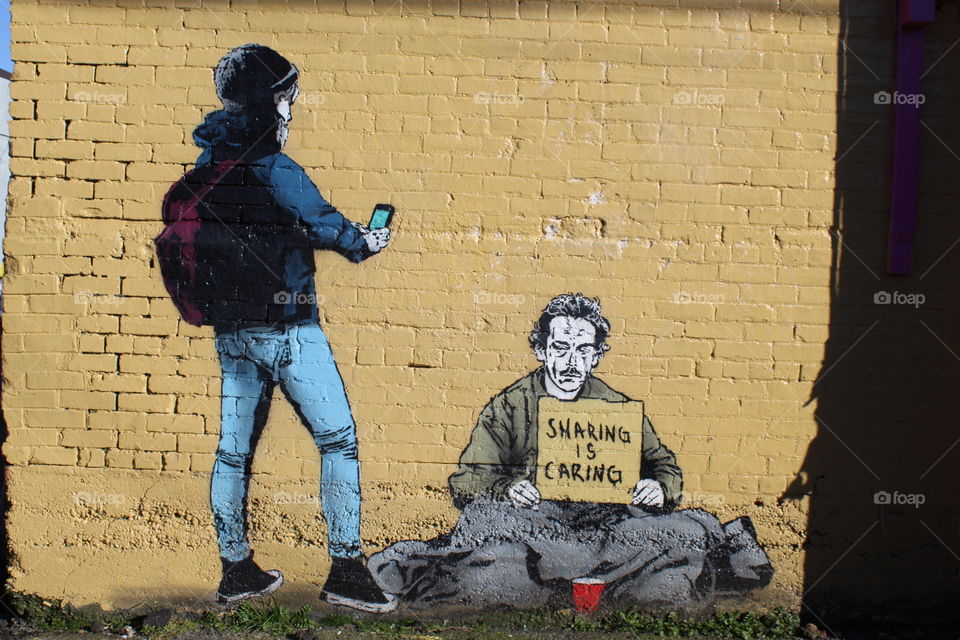 Sharing is caring street art
