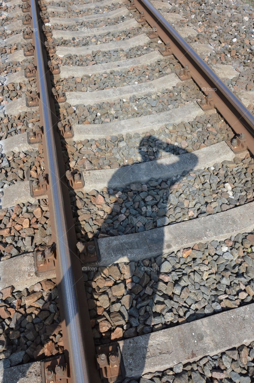 my shadow on railway lines