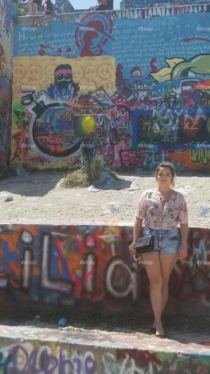 pretty girl and graffiti wall