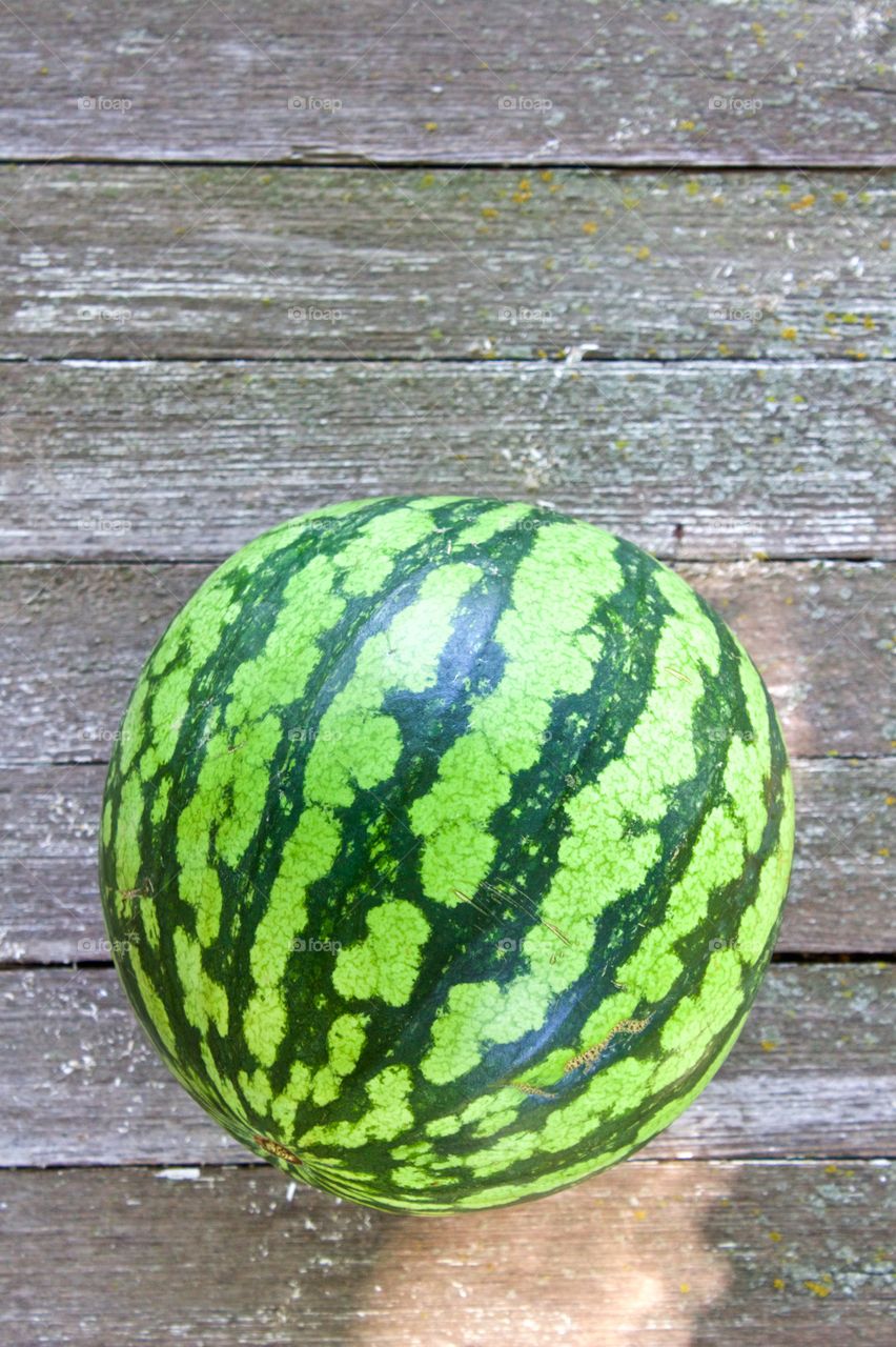 Watermelon on wooden surface