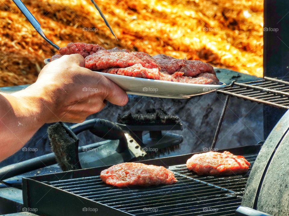 Burgers Going On The Grill