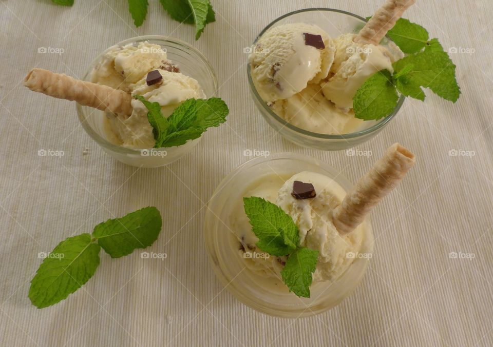 Three bowls of mint chocolate chip ice cream 