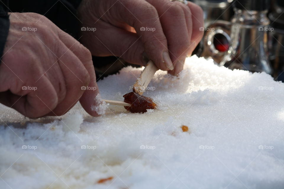 Making Canadian maple syrup candy (taffy)