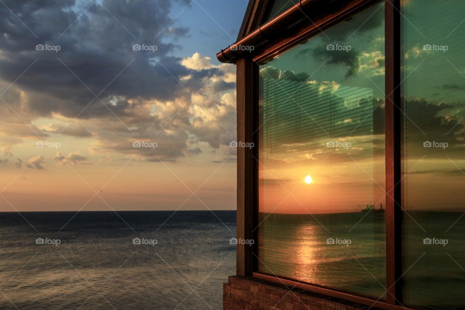 Reflection of beautiful sunset over the Black Sea