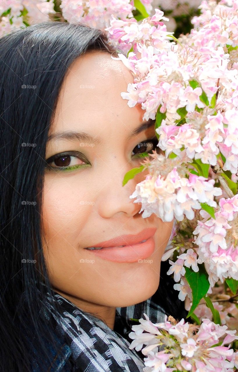 Spring blossom and Asian woman 