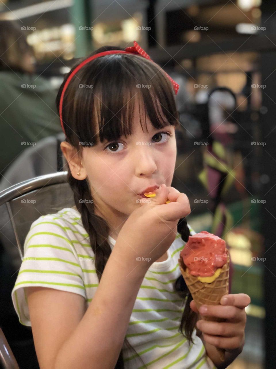 Little girl eating icecream