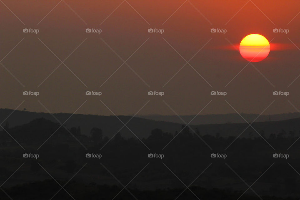 Scenic view mountain during sunset