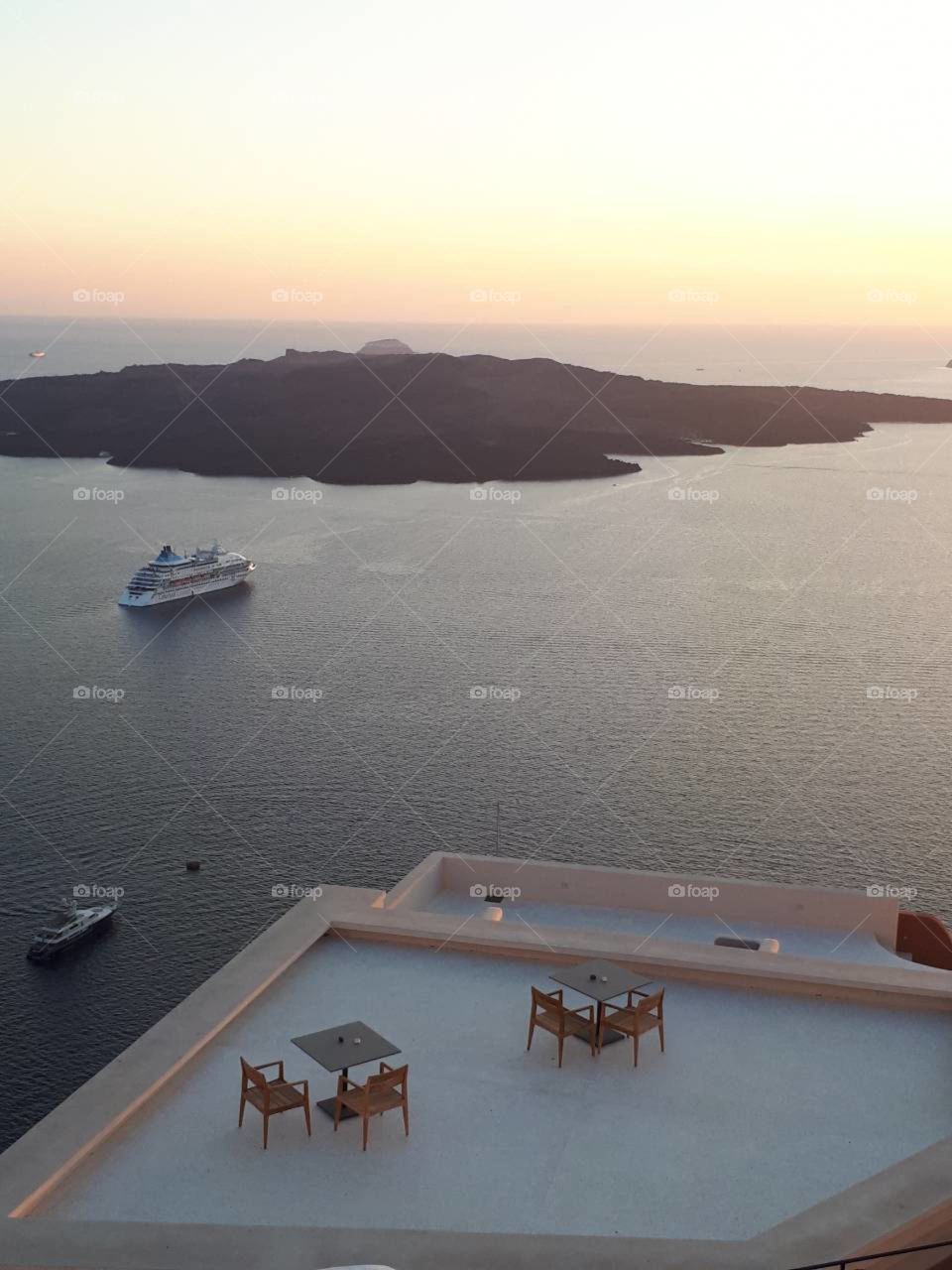 The most amazing terrace in the world. Stunning view. 
Sailing ships under the rose gold colours of the sunset. 
So romantic.