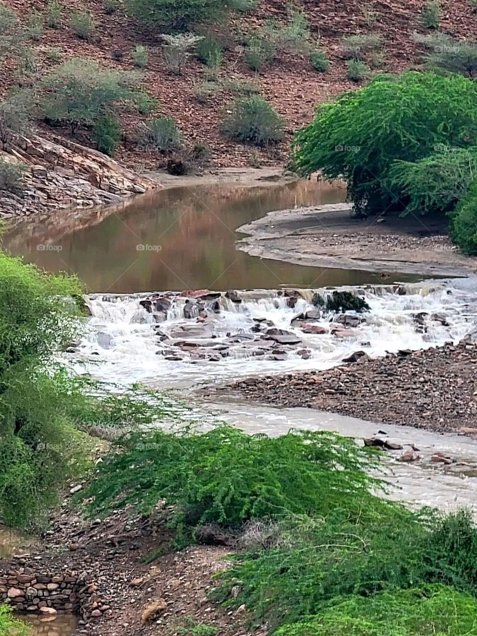 Glory be to God, the magnificent and picturesque view and the natural green trees are a view that is nothing more wonderful than it