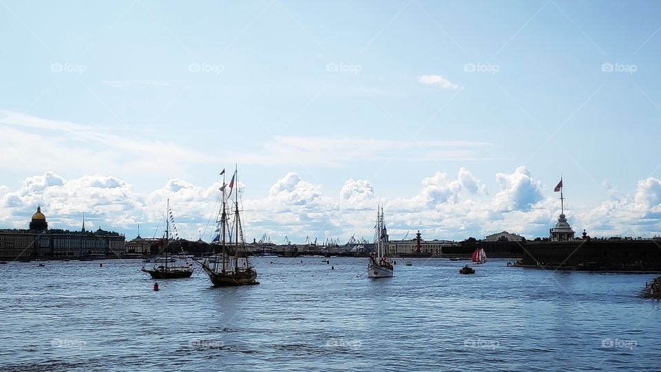 Sails ships and boats on Neva river in Saint-Petersburg