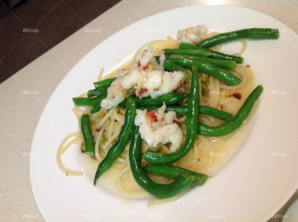 Lobster, green beans and pasta.  