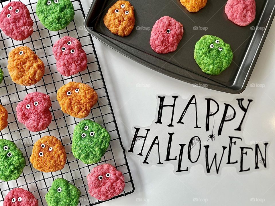 Baking Halloween cookies, making treats for Halloween, homemade cookies ready for guests, baking at home with toddlers, making Halloween treats, monster cookies for Halloween