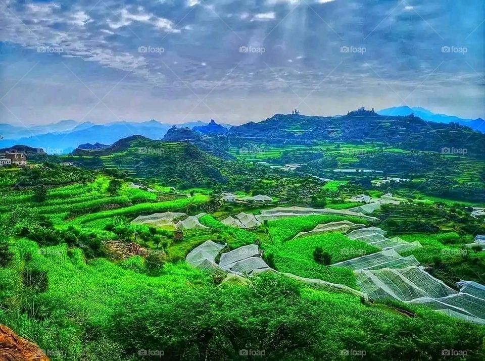 Glory be to God, the magnificent and picturesque view and the natural green trees are a view that is nothing more wonderful than it