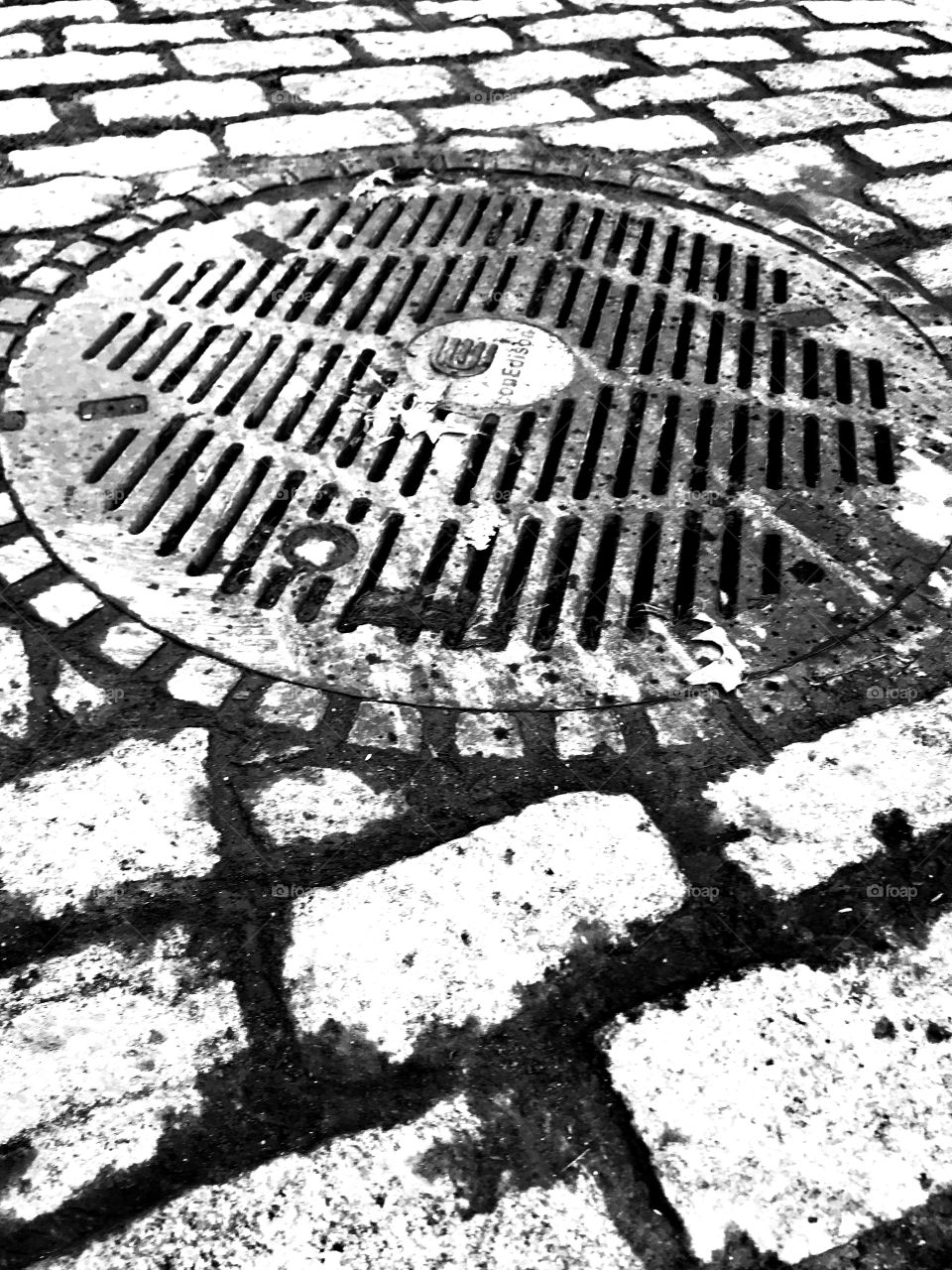 Cobblestone street and Sewage in Greenwich Village New York City 