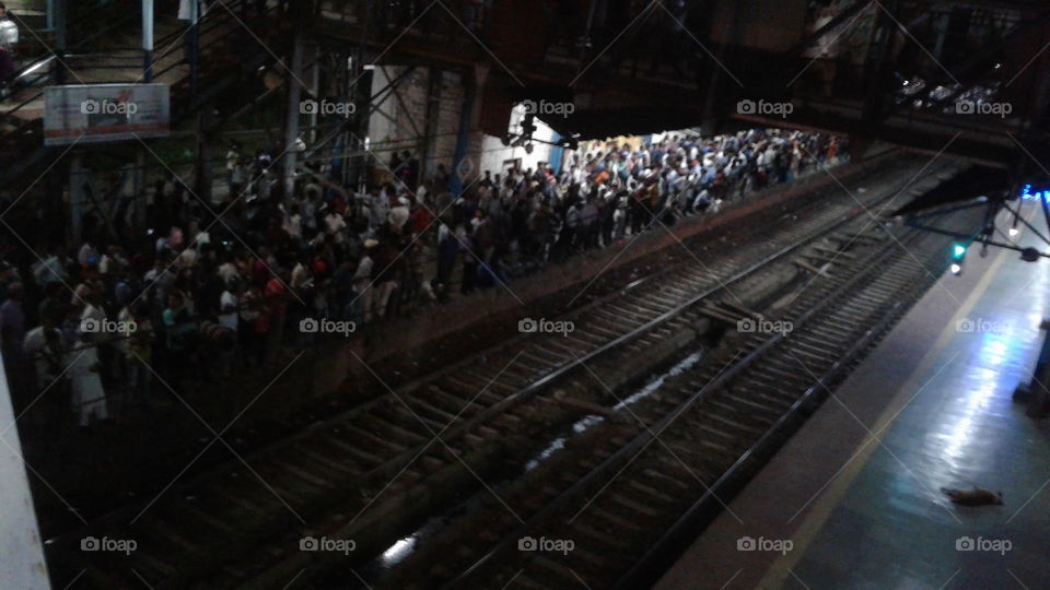 Crowd at Mumbai local station for train. India.