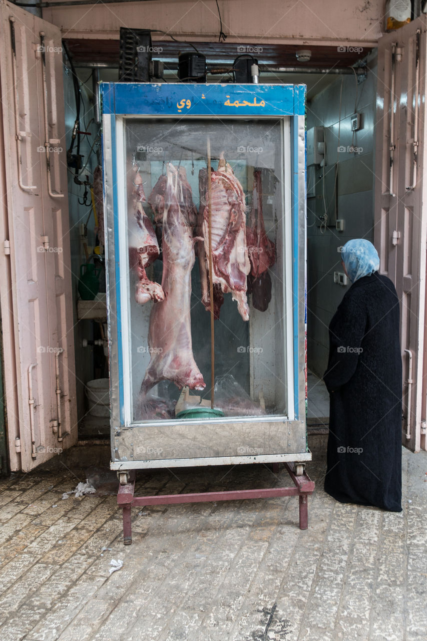 Woman at the Butcher
