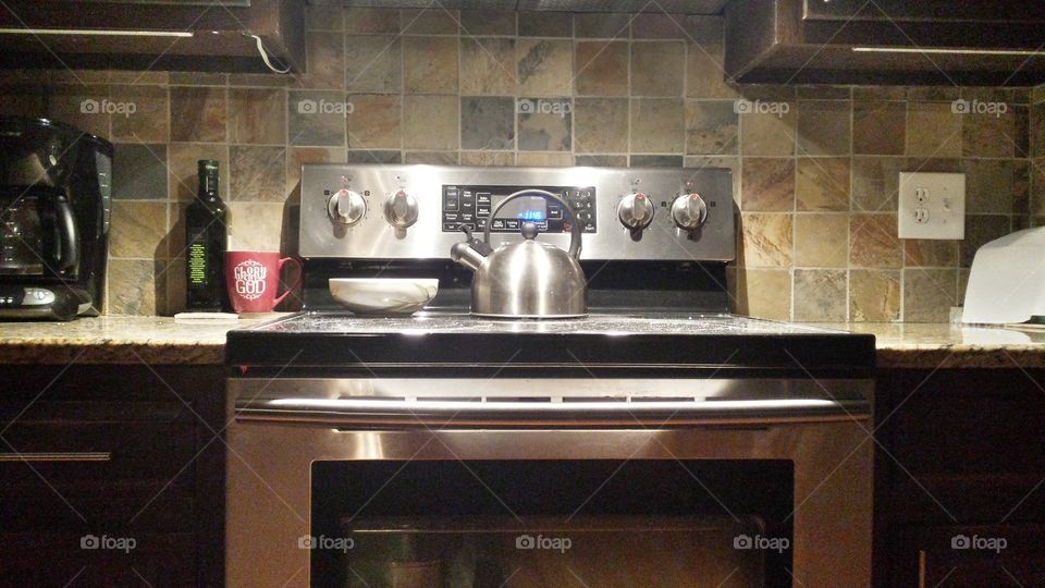kitchen stove oven coffee maker back splash