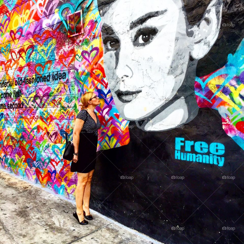 Homage to Audrey. A street art mural in downtown Los Angeles - Hepburn fade and quote, and me greeting her with a breezy kiss! 