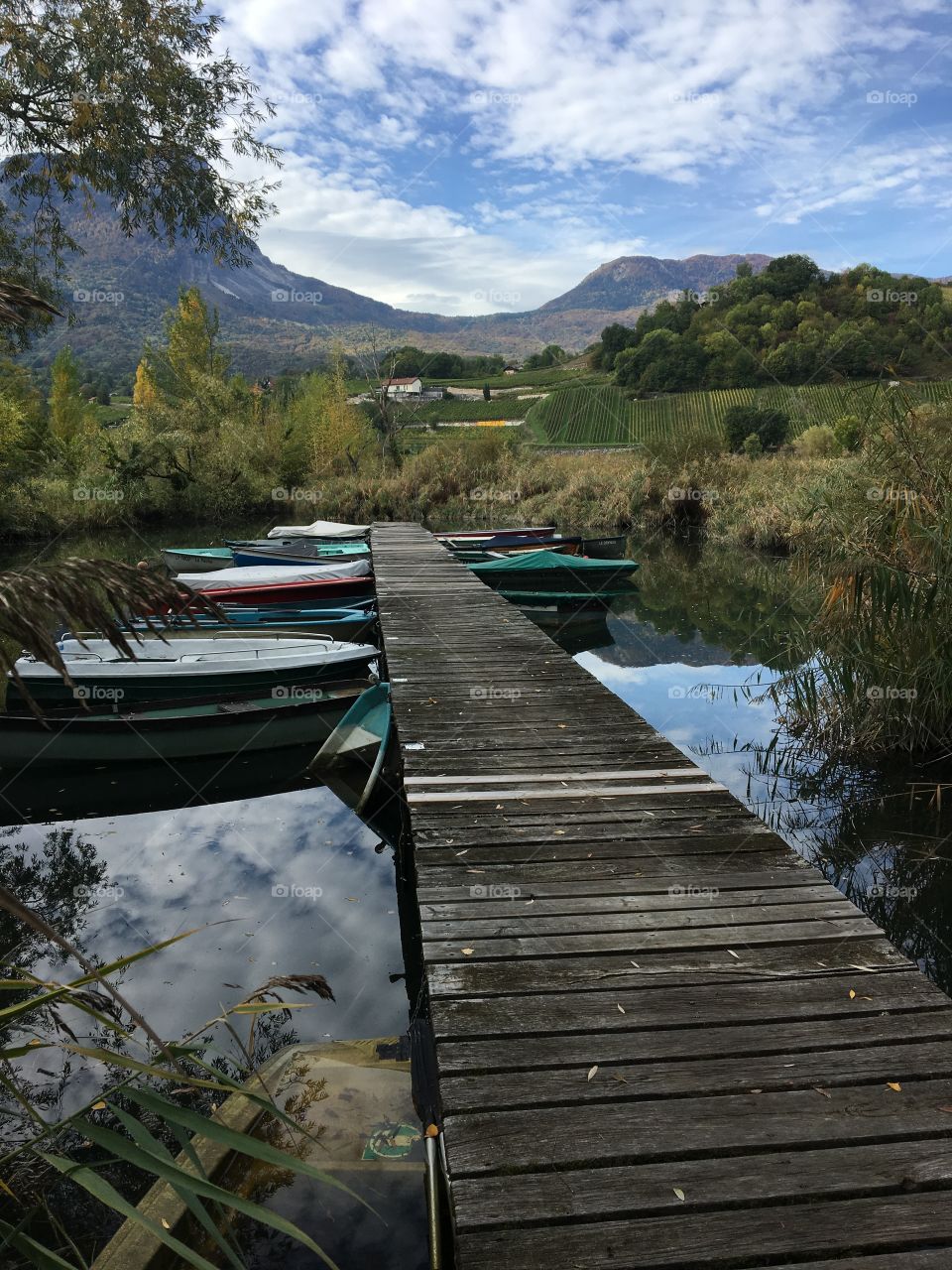 Old boats waiting on a lake