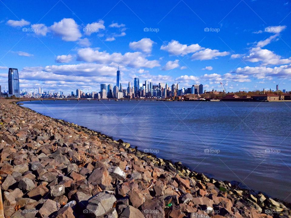 The impressive skyline of Manhattan including Freedom Tower is seen from across the Hudson River on the New Jersey side