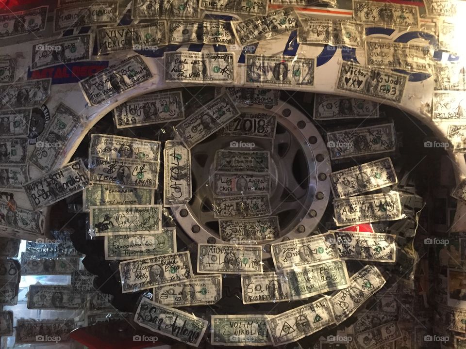 Restaurant in Mexico covered with signed $1 bills