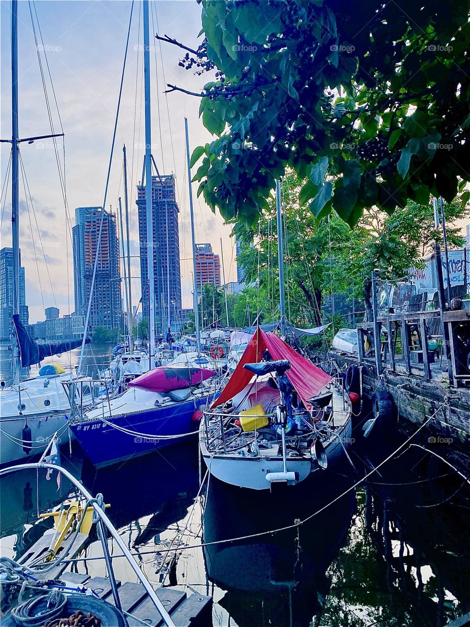 The best view of the picturesque boats here at „Newtown Creek“ by the „Pulaski Bridge“ in LIC, Queens can be experienced from aboard one of them such as this image from the front deck of our boat, the „Salvation“ shows. 2023. Hypnotic Productions