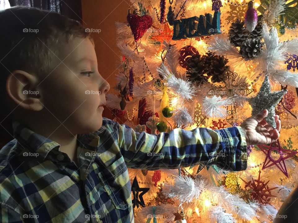 Hanging decorations with Mason. Putting up the Christmas tree 
