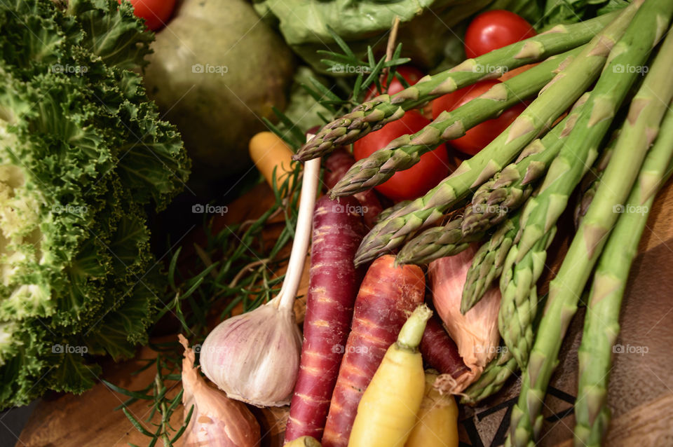 Autumn harvest vegetables on wood cutting board healthy fall cooking conceptual background 