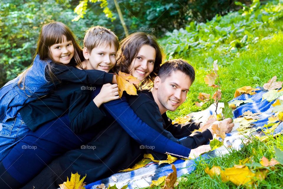 Beautiful family on nature 