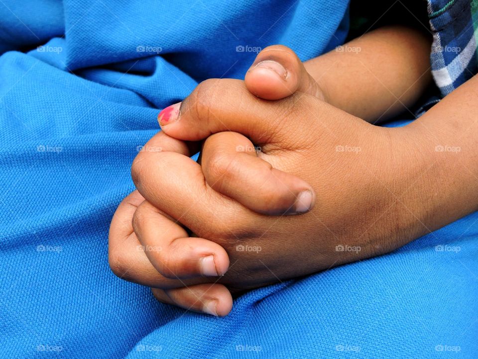 sisters holding hand