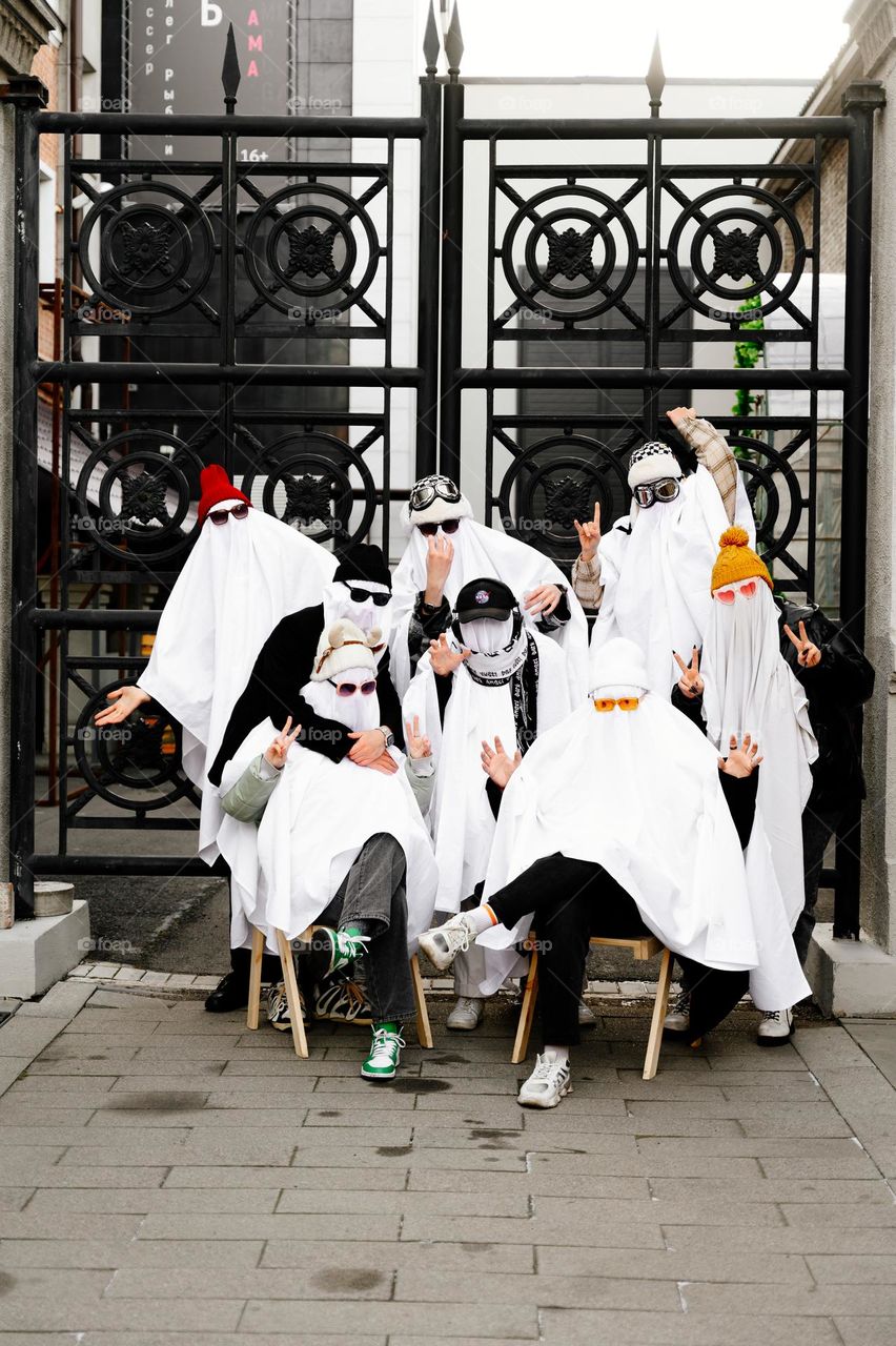 Teenagers in ghost costumes. Halloween party