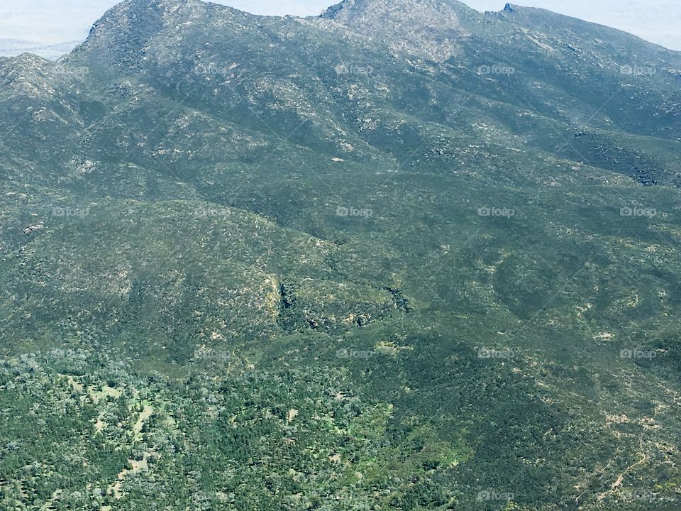 Rare spring colour in the usually arid dry historic Flinders Ranges near wilpena pound in south Australia, shot here from the aerial vantage point if a light plane 