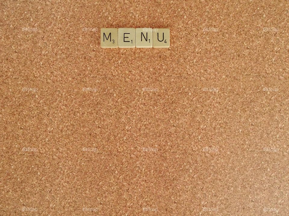 Word on corkboard background