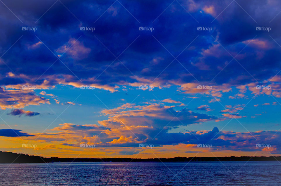 Blue cloud against lake