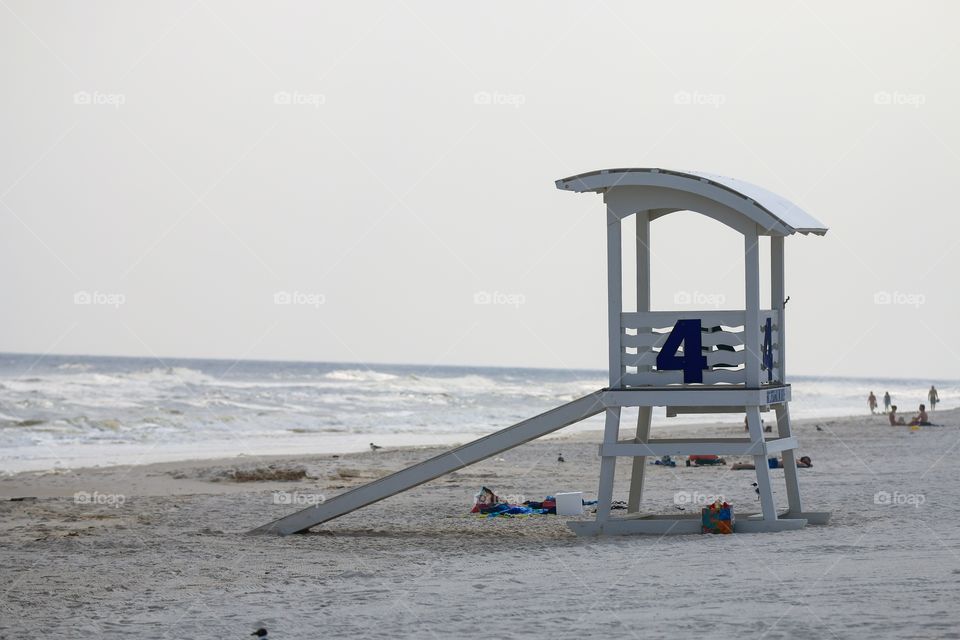 Lifeguard station in the beach with people