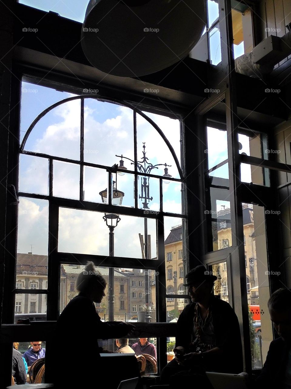 Silhouette of man and woman talking Krakow Poland