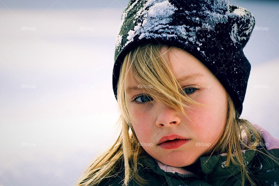 Cute and snowy girl