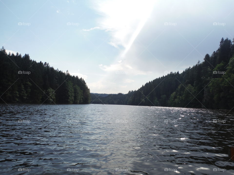 row the boat into paradise. we went out with the boat in a beautiful lake in bavaria