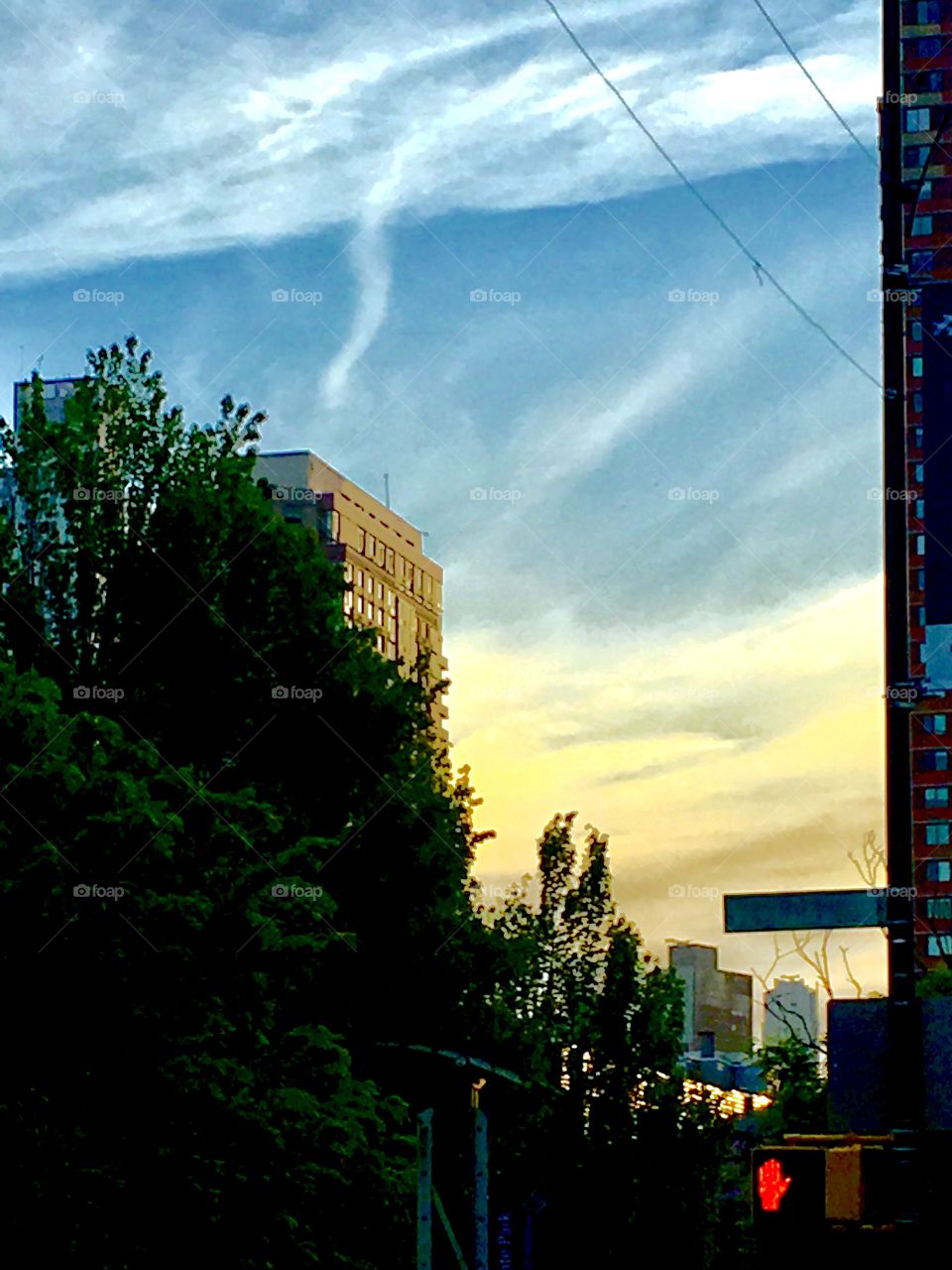 A dreamy looking picture that looks like a castle on a mountain top overlooking the water. It was, however photographed in Long Island City, Queens, New York where I live in 2019. Hypnotic Productions