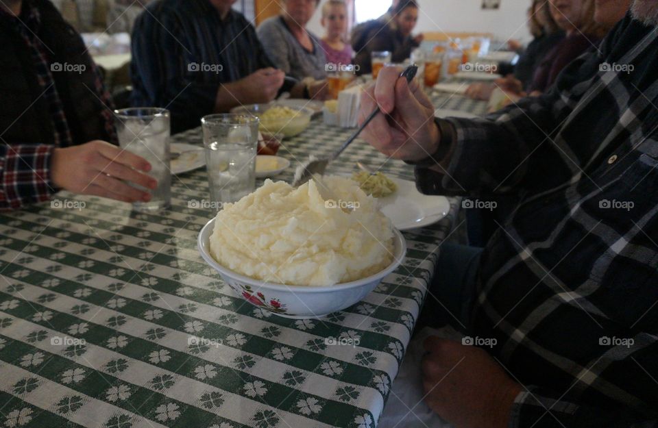 Bowl full of mashed potatoes
