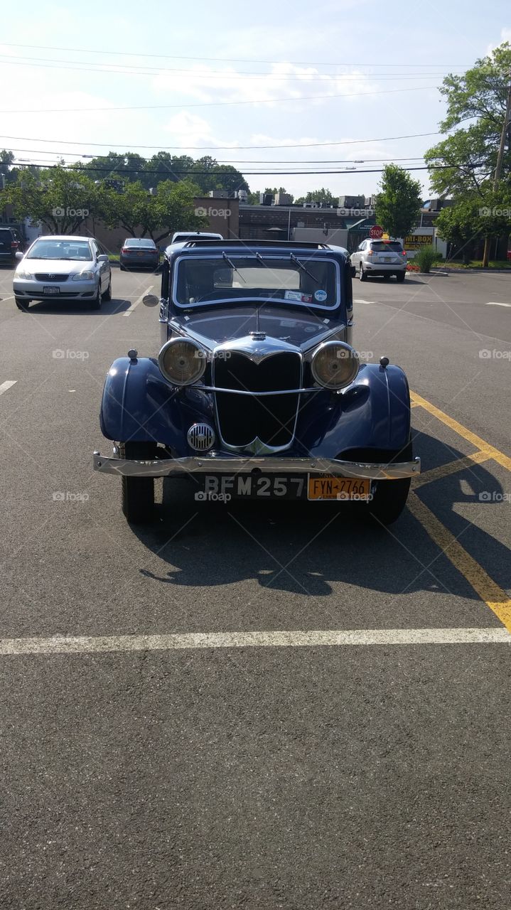 Old blue whip. Saw this car at Korean grocery store not sure what car it is though