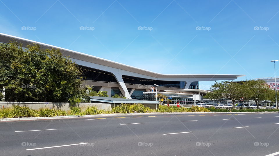 The terminal building at Cape Town international airport with the wing giving the impression of take off